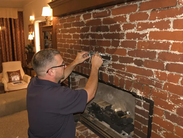 Yorba Linda Chimney Sweep expert fixing a fireplace in Yorba Linda, CA